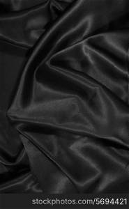 texture of a black satin silk extreme close up