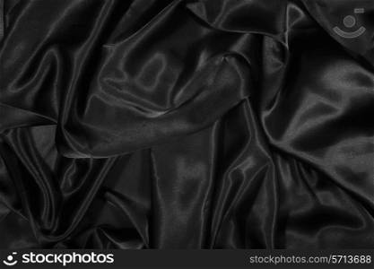 texture of a black satin silk extreme close up