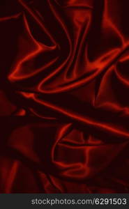 texture of a black silkcloth red satin silk close up