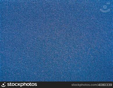 Texture of a blue woven synthetic waterproof fabric closeup
