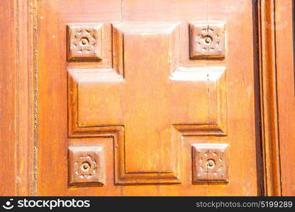 texture of a brown old door in italy europe