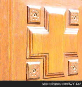 texture of a brown old door in italy europe