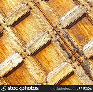 texture of a brown old door in italy europe