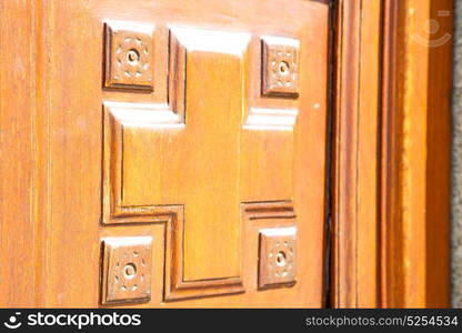 texture of a brown old door in italy europe