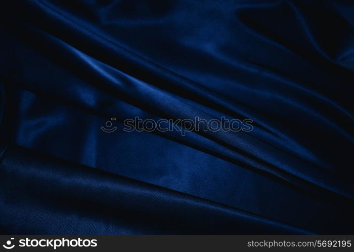 texture of a dark blue silk