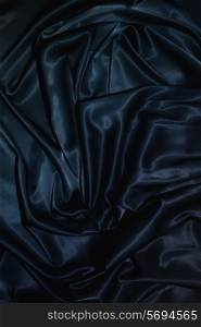 texture of a dark blue silk