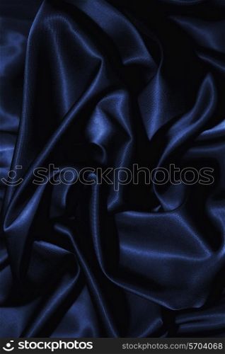 texture of a dark blue silk