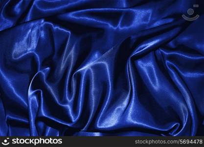 texture of a dark blue silk closeup