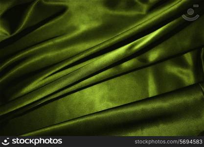 texture of a dark green silk