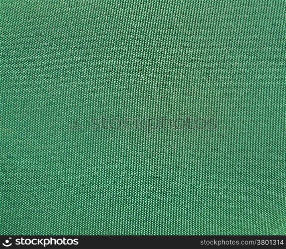 Texture of a green woven synthetic waterproof fabric