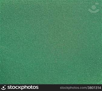 Texture of a green woven synthetic waterproof fabric