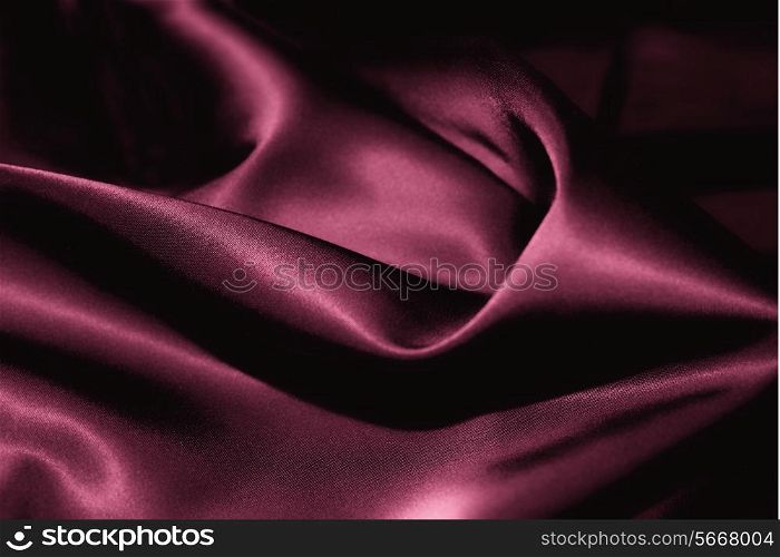 Texture of a pink silk closeup