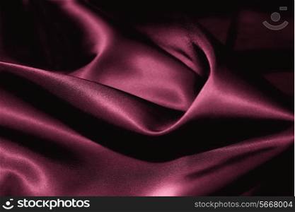 Texture of a pink silk closeup