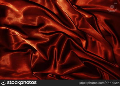 Texture of a red silk closeup