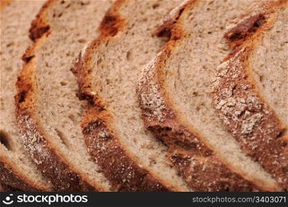 Texture of a sliced fresh dark bread