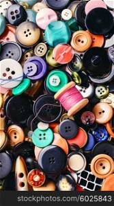 Texture of a variety of buttons from clothing.Top view. texture of the buttons