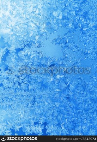 Texture of beautiful natural ice pattern on winter glass