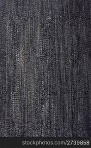Texture of black jeans background closeup