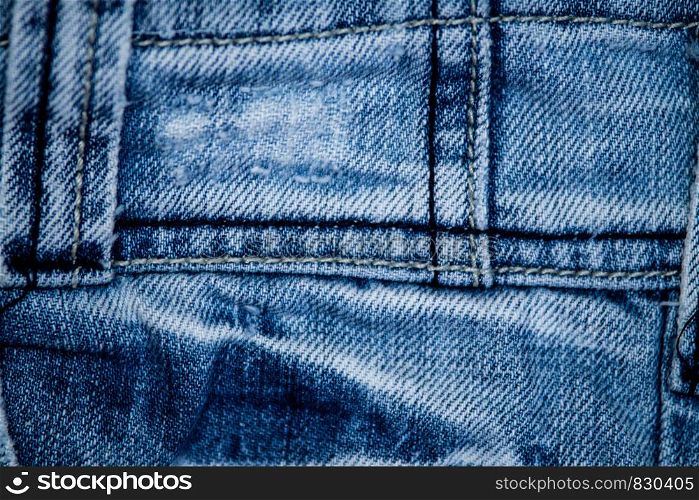 Texture of blue jeans textile. Texture of blue jeans textile close up