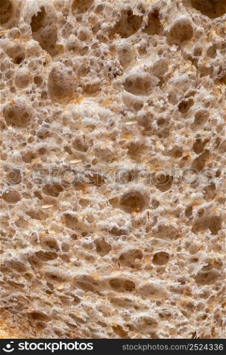 Texture of brown bread baked from wheat flour. High resolution brown bread texture background.