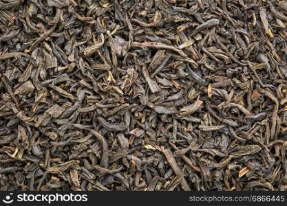 texture of Chinese congou black tea, macro image of loose leaves