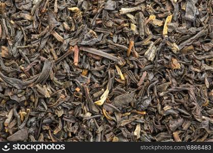 texture of Chinese oolong black tea, macro image of loose leaves