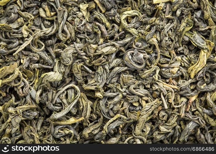 texture of Chinese singlo green tea, macro image of loose leaves