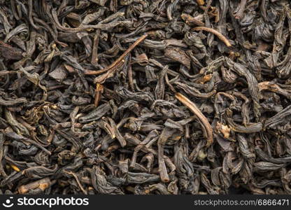 texture of Chinese souchong black tea, macro image of loose leaves