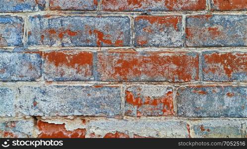 Texture of close-up ancient brick wall