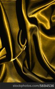 texture of cloth golden satin silk close up