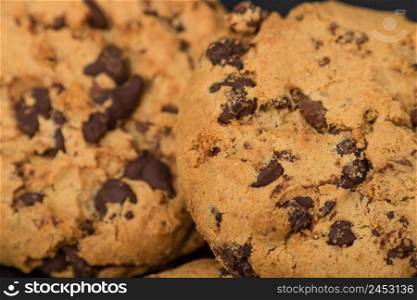 Texture of cookie with chocolate. Close up of chocolate chip cookies, stacked chocolate chip cookies