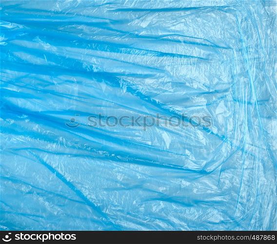texture of crumpled blue polyethylene, full frame, trash bag