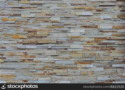 Texture of decorative flat stones wall