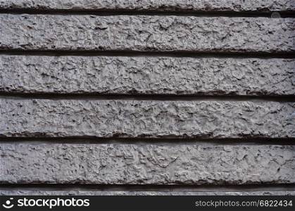 Texture of decorative gray plaster wall surface