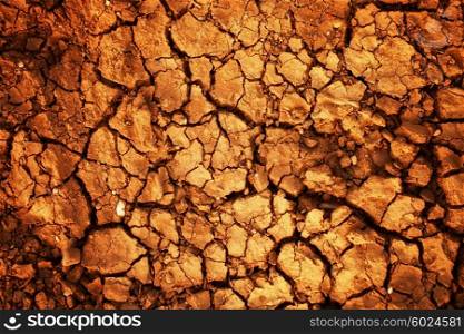 texture of dry cracked clay soil macro