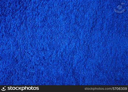 texture of fluffy cotton towels dark blue macro