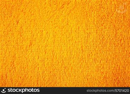 texture of fluffy cotton towels yellow macro