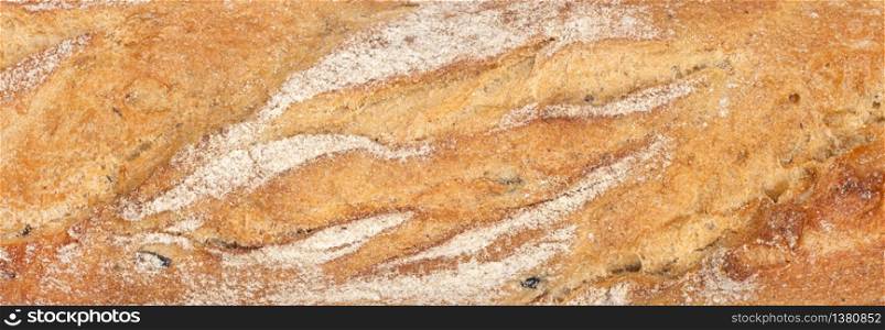 Texture of fresh crispy bread or baguette close up. Long poster. Texture of fresh crispy bread or baguette.