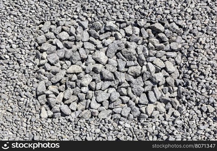 Texture of granite gravel. High resolution image of granite gravel in construction industry. Granite gravel texture