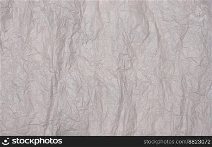 Texture of gray crumpled craft paper, full frame