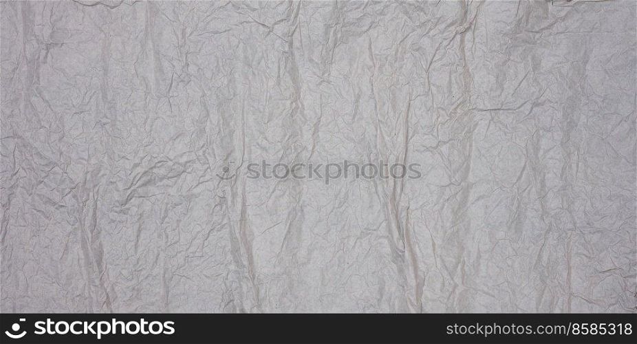 Texture of gray crumpled paper, background for the inscription. Blank for the designer