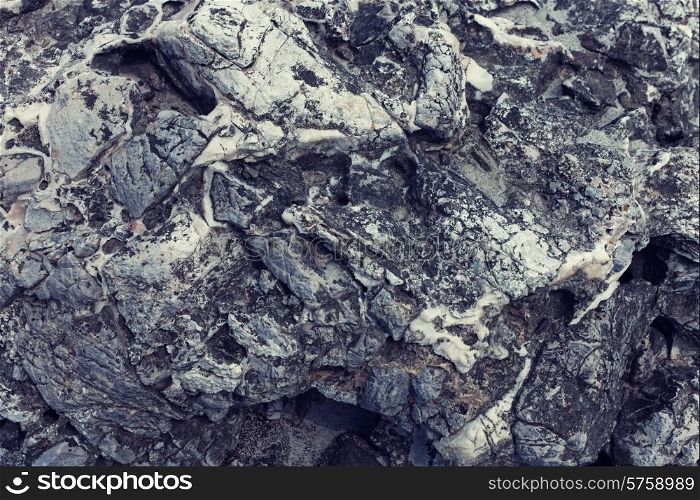Texture of gray volcanic stone close up