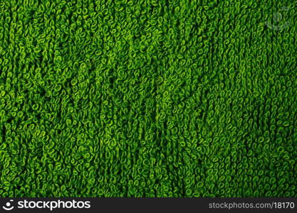 Texture of green terry towel close up