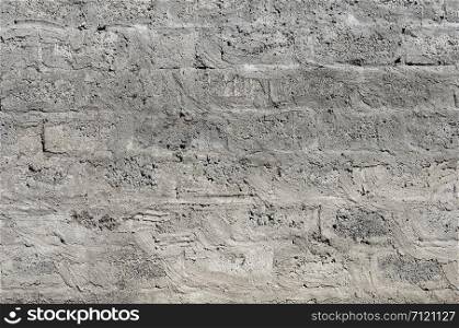 Texture of grey concrete blocks wall surface