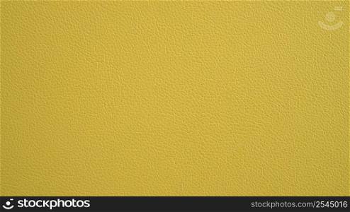 Texture of grunge panorama yellow leather. Yellow background.