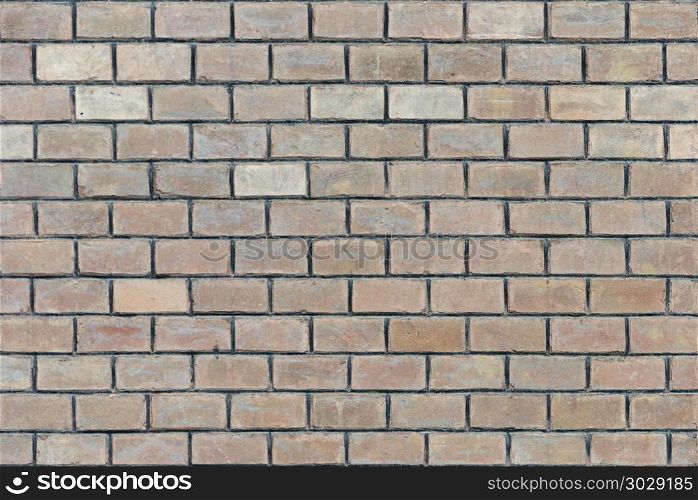 Texture of light grey brick wall surface. Grey brick wall