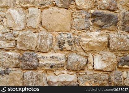 Texture of Medieval castle stone wall. Ancient stone wall texture