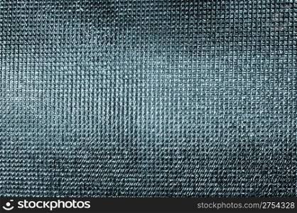 Texture of metal blue tone. Detailed finely scaly metal surface