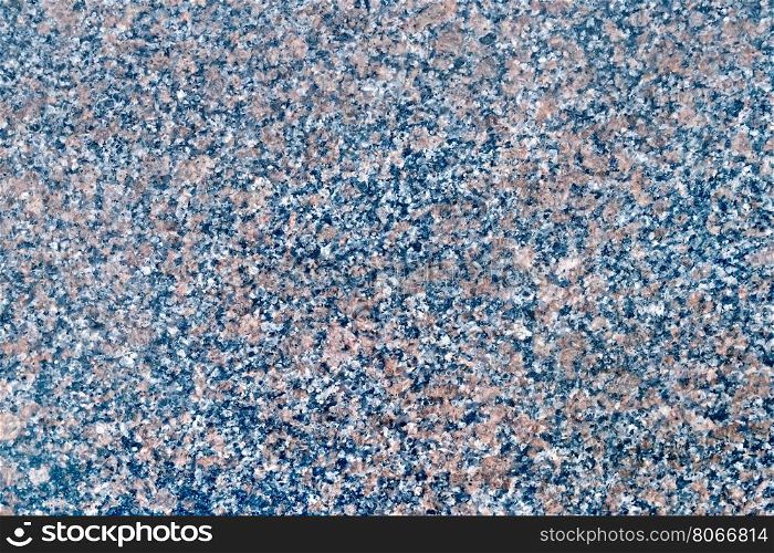 Texture of natural treated black and brown spotted granite