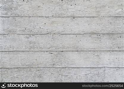 texture of new gray grunge concrete wall with embedded grain and pattern of wooden planks for background